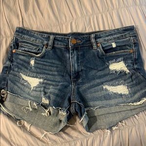 blue jean shorts with rips